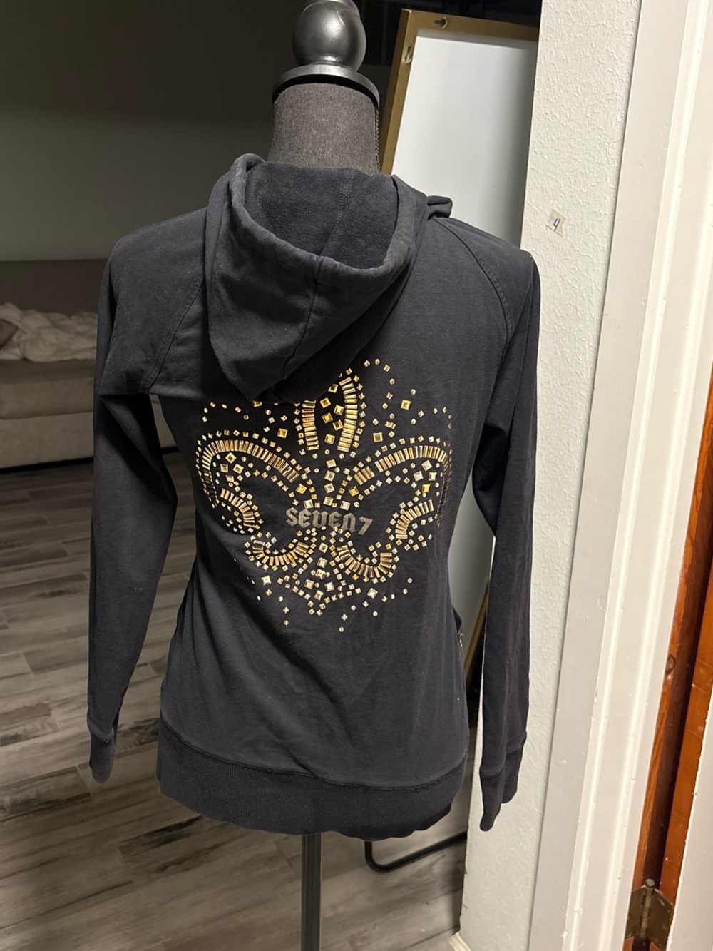 Seven7 Black Hoodie with Gold Stud Fleur-de-Lis Back Design